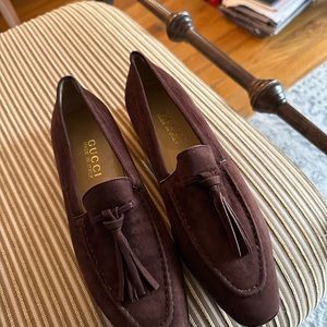 Brown suede Gucci loafers with tassel